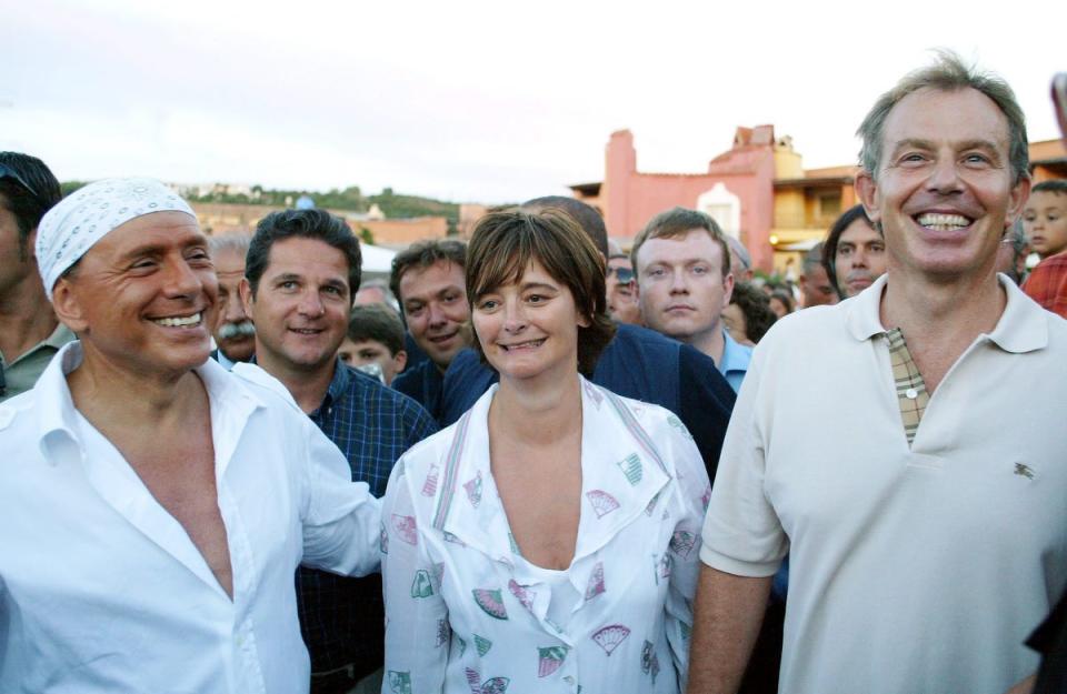 Tony Blair and his wife Cherie during a visit to Silvio Berlusconi’s Certosa Villa in Sardinia in 2004 (EPA)