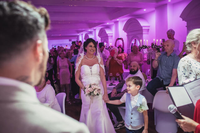 The couple surprised their guests by tying the knot at their engagement party (SWNS)
