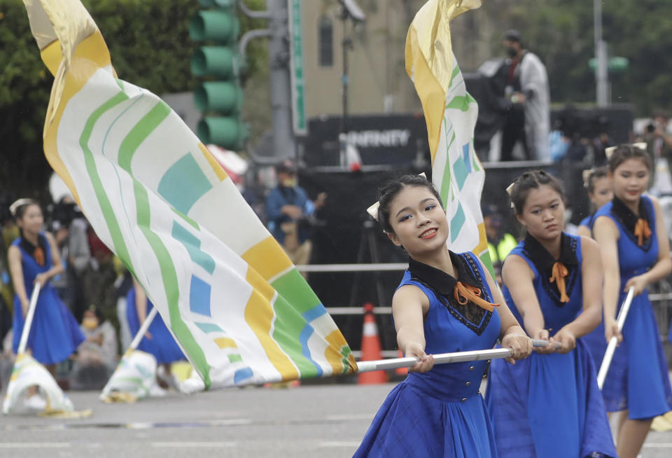 Dancers perform during National Day celebrations in front of the Presidential Building in Taipei, Taiwan, Monday, Oct. 10, 2022. (AP Photo/Chiang Ying-ying)