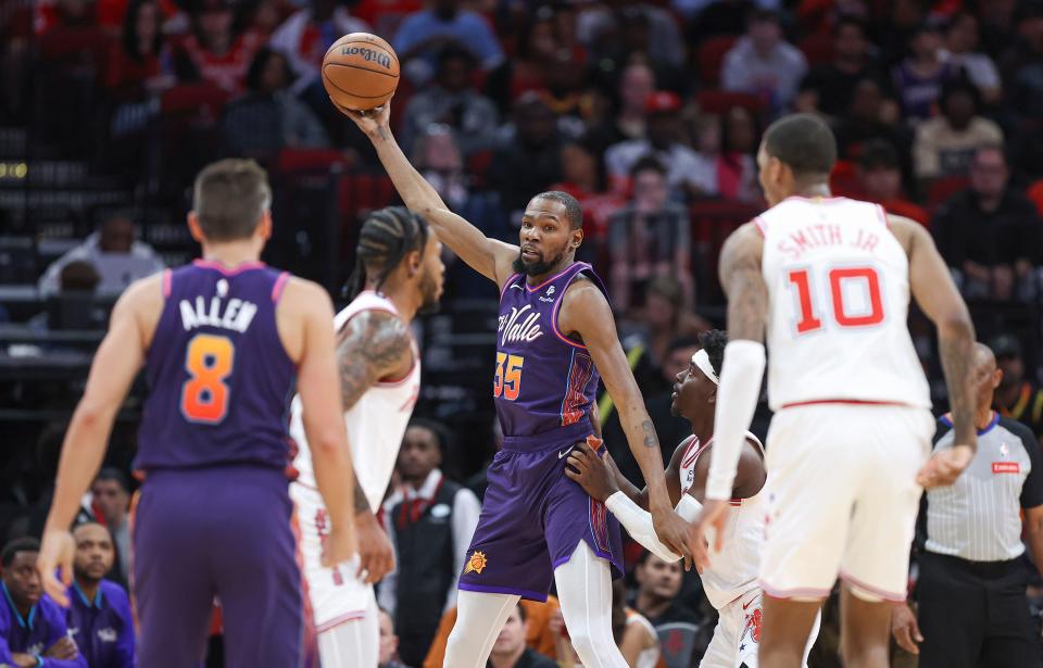 Phoenix Suns forward Kevin Durant (35) controls the ball during the second quarter against the Houston Rockets at Toyota Center.
