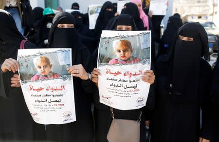 Women demonstrate to demand the reopening of Sanaa airport outside the United Nations offices in Sanaa, Yemen December 10, 2018. The posters read: "Open Sanaa airport for the medicine to get in!" REUTERS/Khaled Abdullah