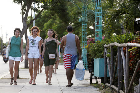 Tourists walk in Varadero, Cuba, December 6, 2018. Picture taken December 6, 2018. REUTERS/Fernando Medina