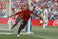 <p>Sergio Ramos celebrates after putting Spain ahead </p>