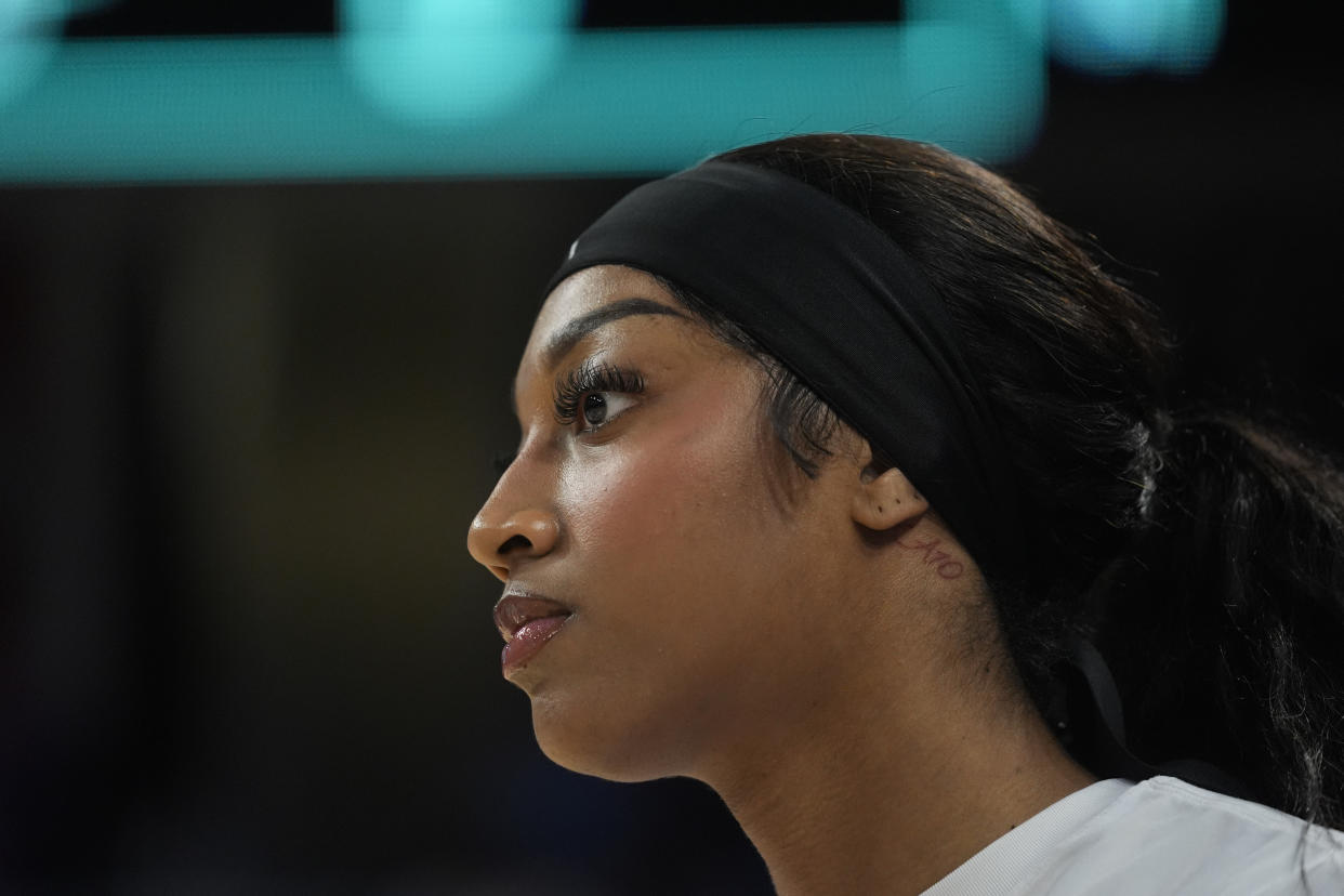 Chicago Sky's Angel Reese warms up before a WNBA basketball game against the Indiana Fever, Friday, Aug. 30, 2024, in Chicago. (AP Photo/Erin Hooley)