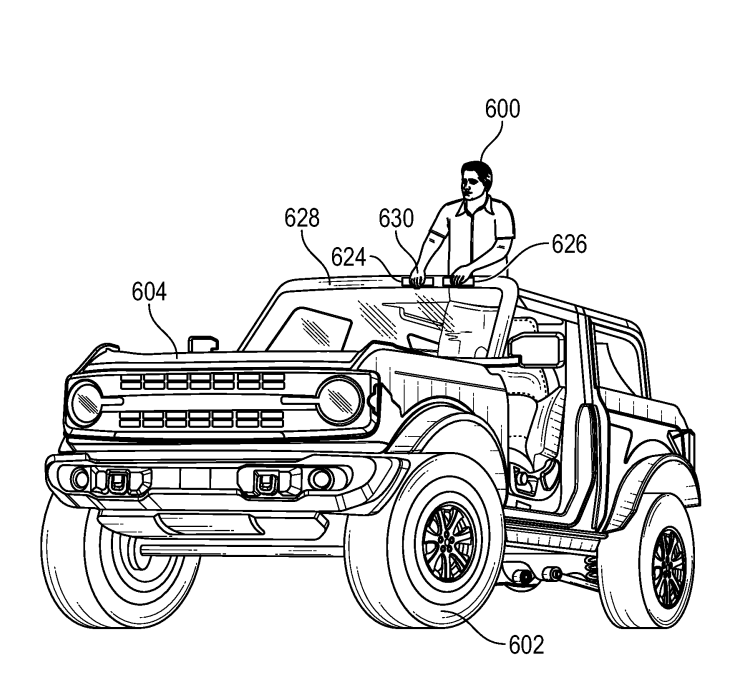 Capacitive touch controls in the windshield header could enable control of the vehicle from a standing position. <em>USPTO</em>