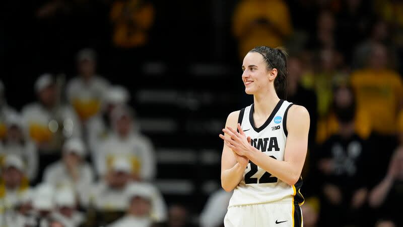 Iowa guard Caitlin Clark reacts in a second-round college basketball game against West Virginia in the NCAA Tournament, Monday, March 25, 2024, in Iowa City, Iowa. Iowa won 64-54.