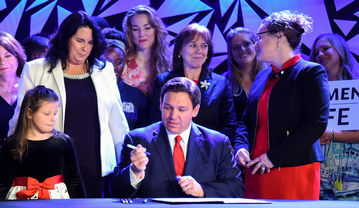 Governor Ron DeSantis signs Florida's 15-week abortion ban into law at Nacion de Fe church in Kissimmee, on April 14, 2022. (Paul Hennessy / SOPA Images/LightRocket via Getty Images file)