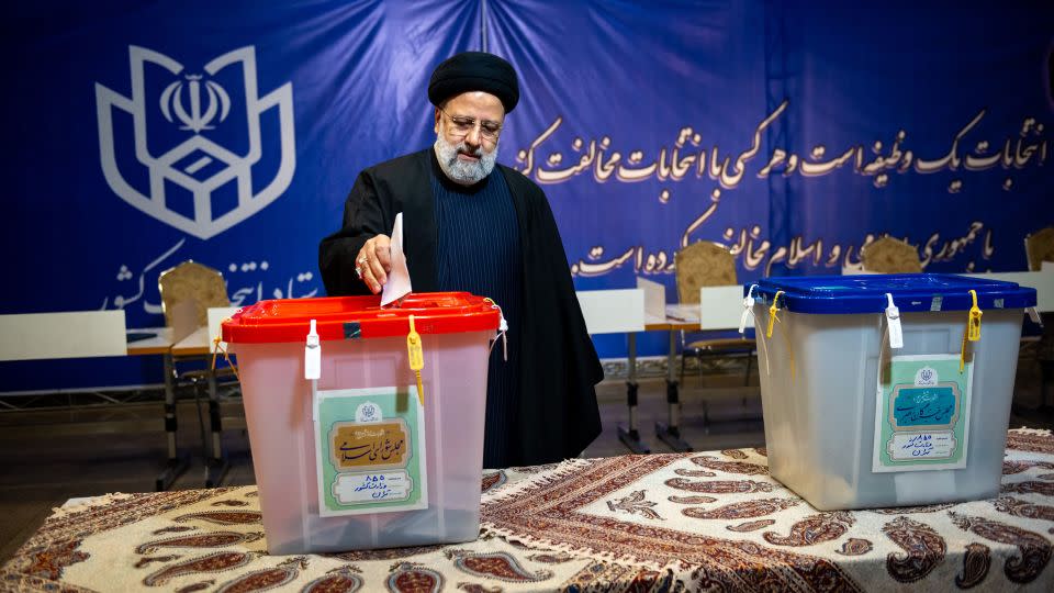Iranian President Ebrahim Raisi casts his vote at a Tehran polling station, March 1, 2024. - Hossein Beris/Middle East Images/AFP via Getty Images