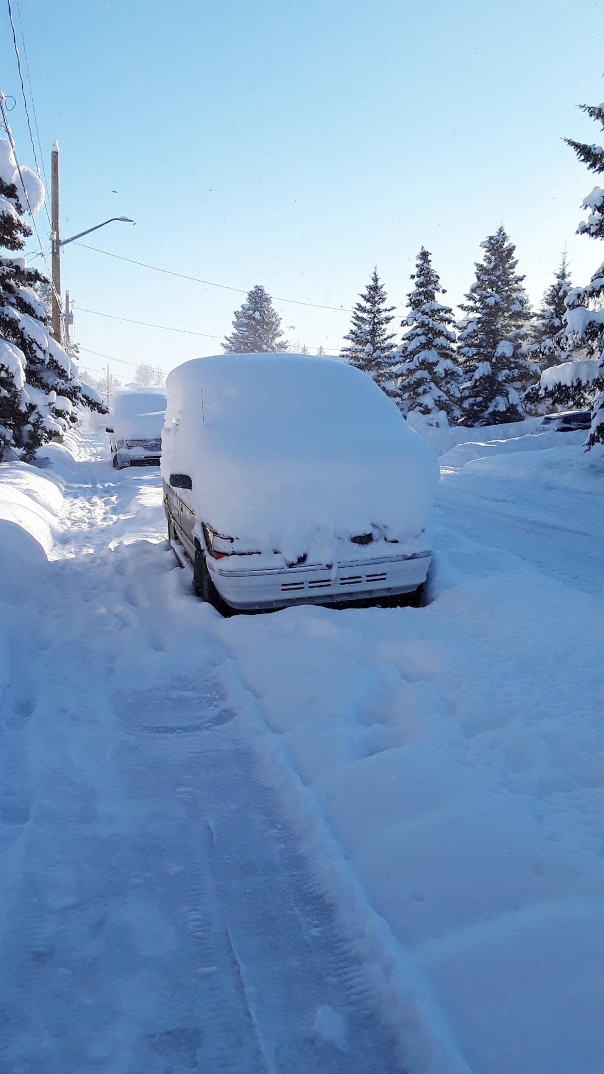 A car blanketed in snow in Pincher Creek in this file photo from 2020. (Submitted by Tim Oczkowski - image credit)