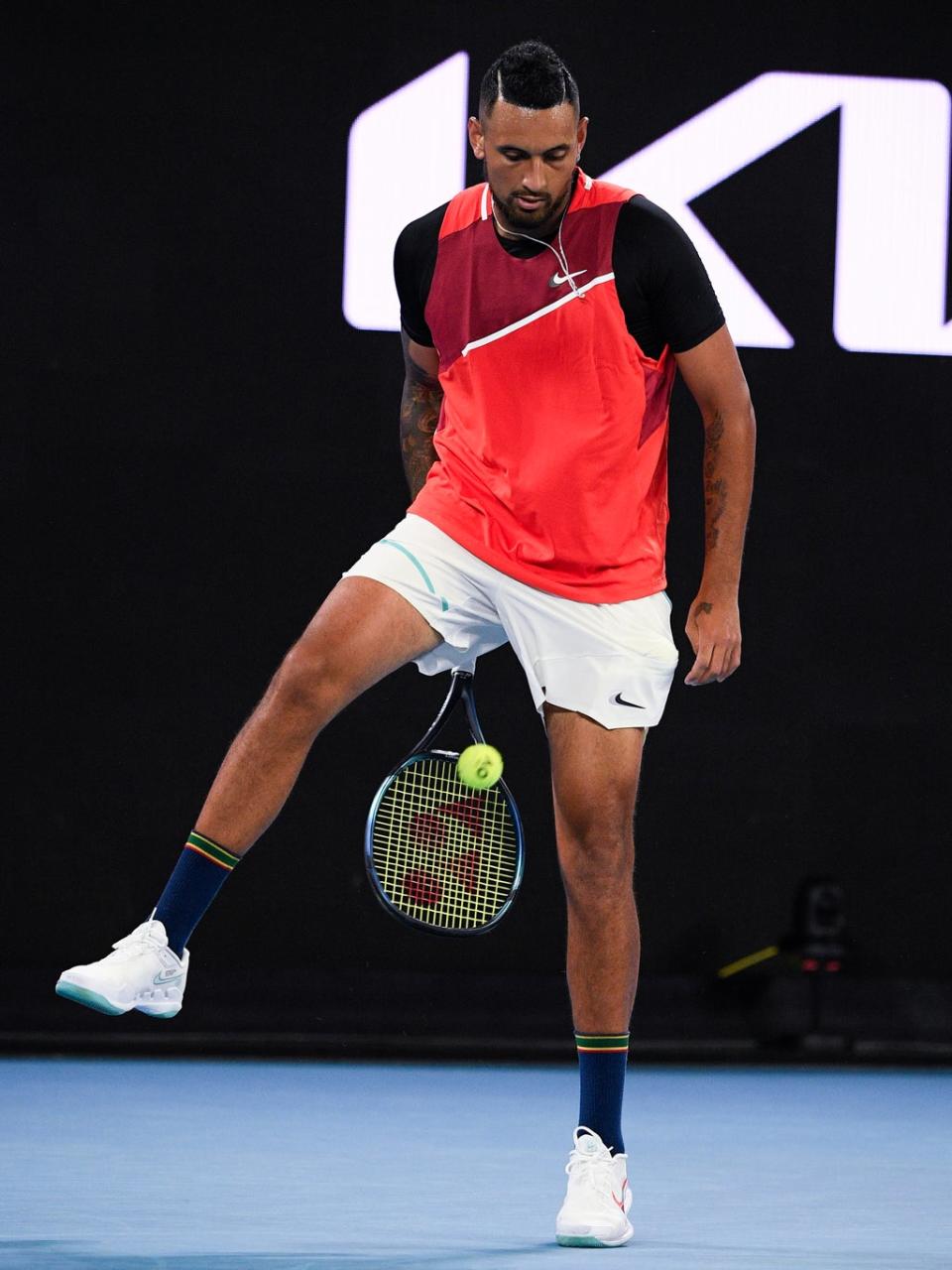 Ever the showman, Kyrgios attempted some trick shots on his way to victory over Broady (Andy Brownbill/AP) (AP)