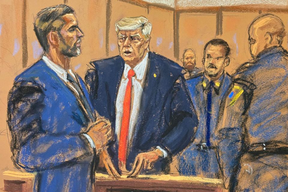 A courtroom sketch depicts Donald Trump chatting with his son Eric Trump in a Manhattan criminal courtroom on 30 April. (REUTERS)