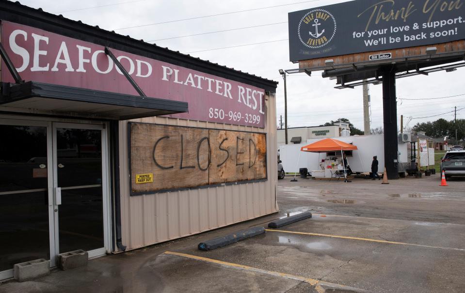 Gulf Coast Seafood serves food from a new food truck on Feb. 9, 2023.. The popular Nine Mile Road eatery was severely damaged by fire late last year. 
