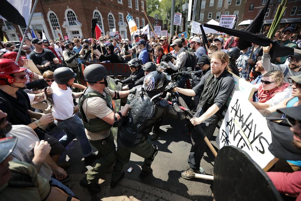 White nationalists, neo-Nazis and members of the Alt-Right clash with counter protesters in Emancipation Park during the "Unite the Right" rally Aug. 12, 2017, in Charlottesville, Va. Police declared the rally an unlawful gathering and forced people out of the park, where a statue of Confederate Gen. Robert E. Lee was slated to be removed.