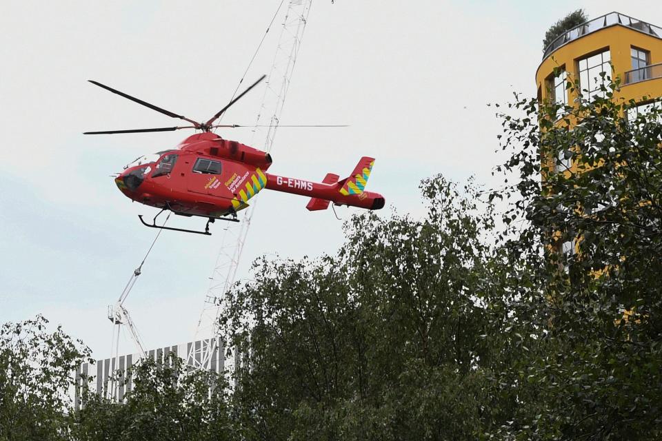 A London Air Ambulance helicopter takes off from outside the Tate Modern gallery in London on August 4, 2019 after it was put on lock down and evacuated after an incident involving a child falling from height and being airlifted to hospital. - London's Tate Modern gallery was evacuated on Sunday after a child fell "from a height" and was airlifted to hospital. A teenager was arrested over the incident, police said, without giving any details of the child's condition. (Photo by Daniel SORABJI / AFP)        (Photo credit should read DANIEL SORABJI/AFP/Getty Images)