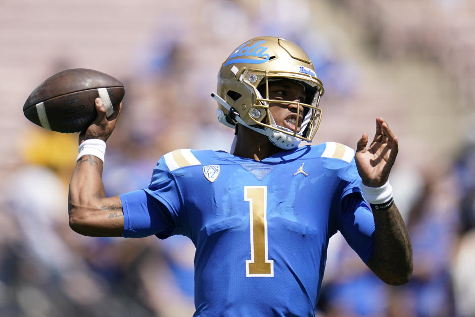 UCLA Bruins quarterback Dorian Thompson-Robinson (1) throws during the first half of an NCAA college football game against the Hawaii Warriors Saturday, Aug. 28, 2021, in Pasadena, Calif. (AP Photo/Ashley Landis)