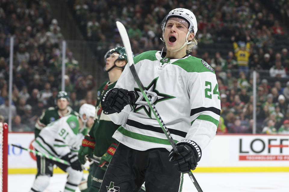 ADDS THAT IT WAS A SHORT-HANDED GOAL - Dallas Stars center Roope Hintz (24) celebrates after scoring a short-handed goal against the Minnesota Wild during the first period of an NHL hockey game Monday, Jan. 8, 2024, in St. Paul, Minn. (AP Photo/Matt Krohn)