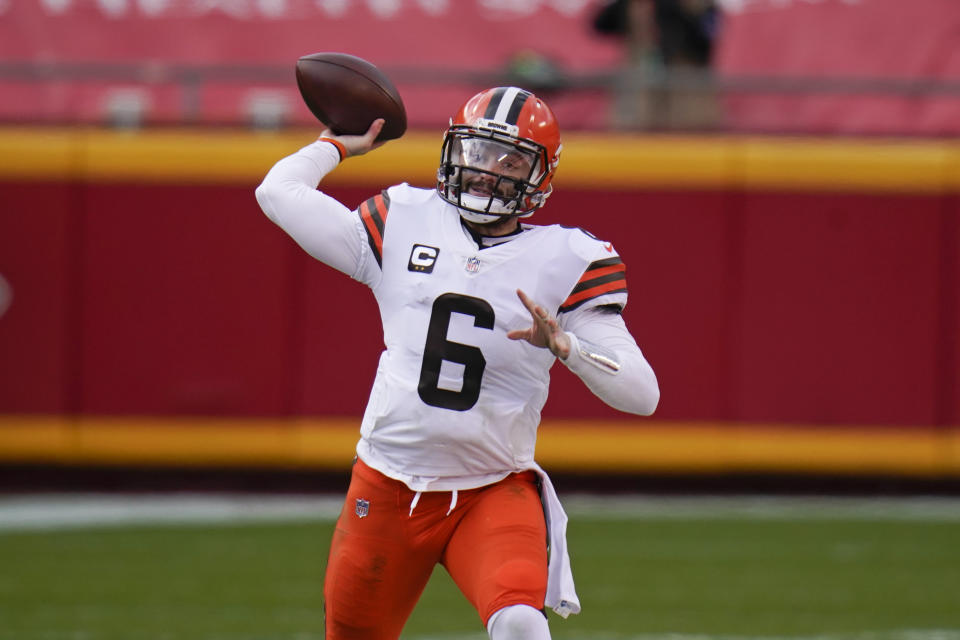 Cleveland Browns quarterback Baker Mayfield (6) throws a pass during the first half of an NFL divisional round football game against the Kansas City Chiefs, Sunday, Jan. 17, 2021, in Kansas City. (AP Photo/Jeff Roberson)