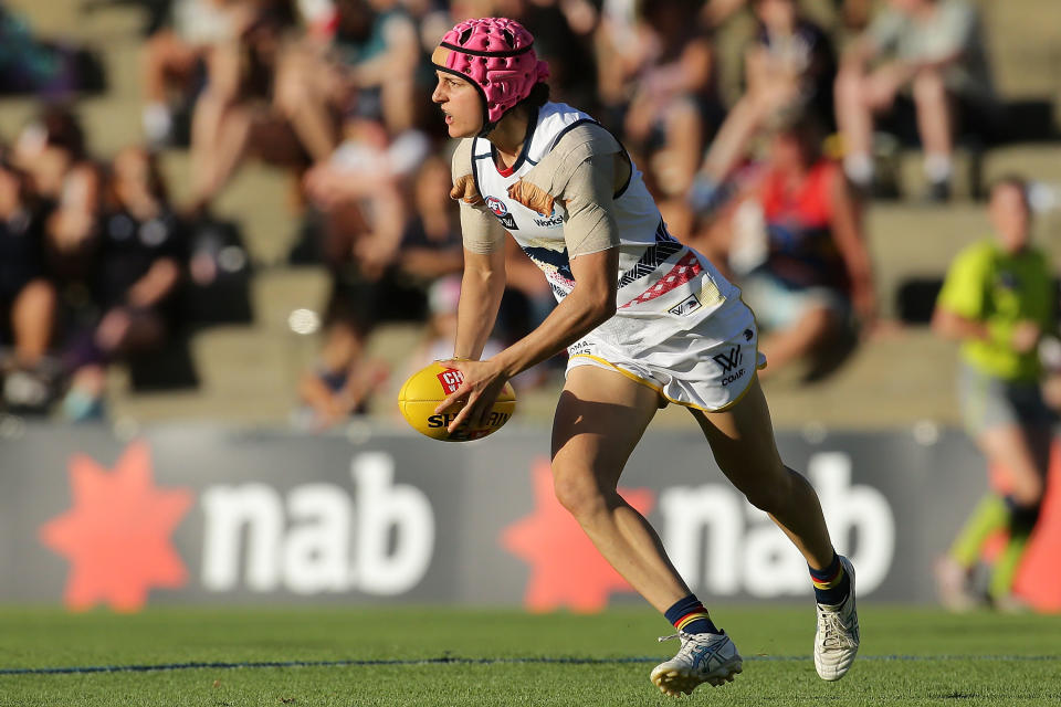 FREMANTLE, WEST AUSTRALIA - FEBRUARY 26: Heather Anderson of the Crows looks to pass the ball during the AFL Women's Fourth Round match between the Fremantle Dockers and the Adelaide Crows at Fremantle Oval on February 26, 2017 in Fremantle, Australia.  (Photo by Will Russell/AFL Media/Getty Images)