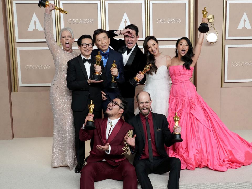 Cast and Directors of "Everything Everywhere All at Once" pose after winning "Best Picture" at the 2023 Academy Awards.