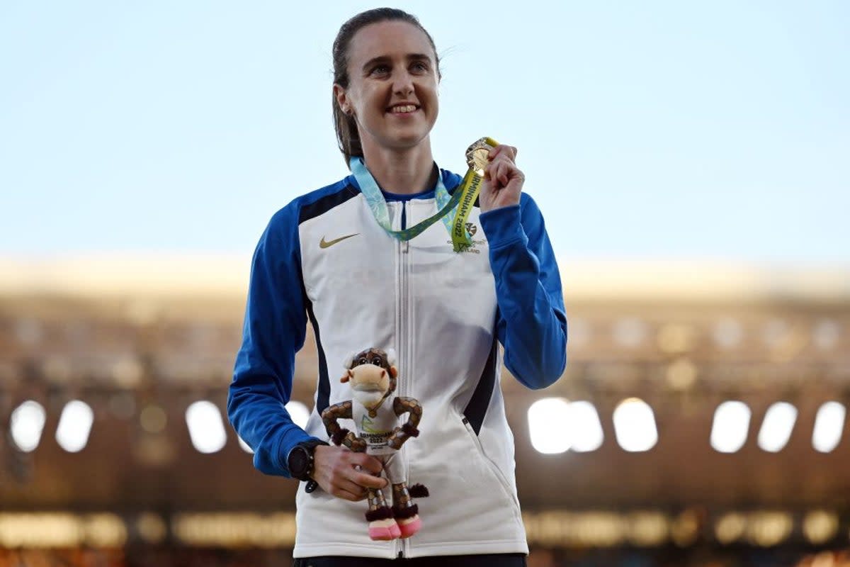 Laura Muir celebrates her gold on the final day of athletics in Birmingham  (AFP via Getty Images)