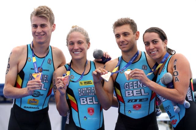 Belgium’s Claire Michel (far right) has fallen ill after taking part in the women's triathlon with team-mates