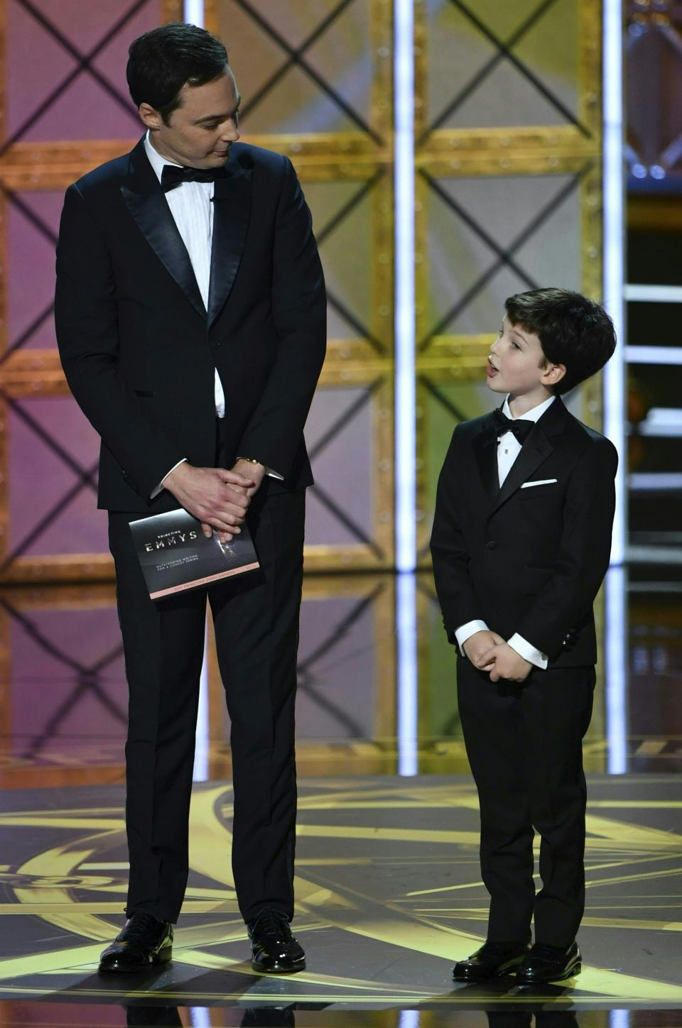 Jim parsons and Iain Armitage speak onstage during the 69th Emmy Awards at the Microsoft Theatre on Sept. 17, 2017 in Los Angeles, California.