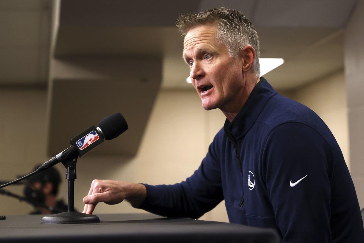 Reacting to the Uvalde, Texas, school shooting earlier in the day, Golden State Warriors coach Steve Kerr makes a statement before Warriors played the Dallas Mavericks on Tuesday, May 24, 2022, in Dallas. 