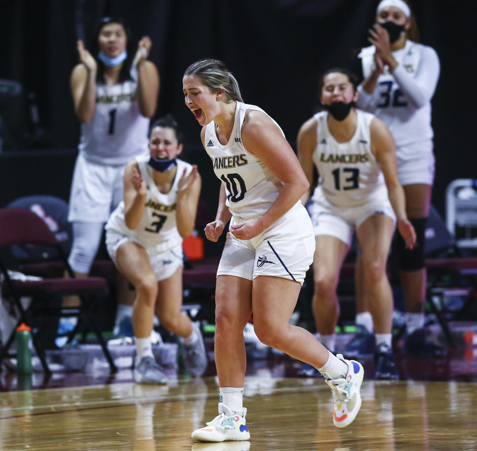 California Baptist's Georgia Dale reacts after a traveling violation was called against Grand Canyon during the first half of an NCAA college basketball game for the championship of the Western Athletic Conference women's tournament Saturday, March 13, 2021, in Las Vegas. (AP Photo/Chase Stevens)