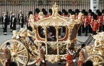 <p>Queen Elizabeth II rides in her Golden coach with Prince Philip during her Silver jubilee celebration.</p>