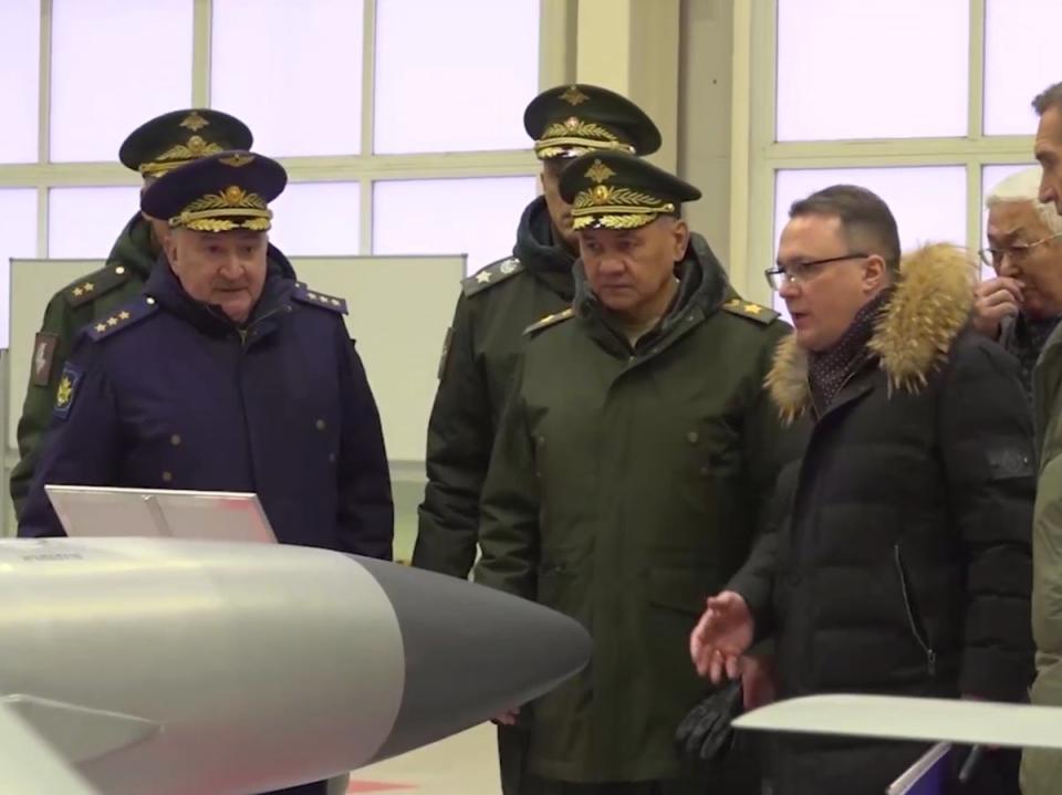 Sergei Shoigu (centre) visits a Russian weapons factory in the Moscow region in January suspected of building modified FAB bombs (Telegram)