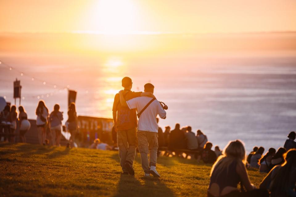 Music fans enjoy the sunset at Boardmasters in Cornwall (Will Bailey)