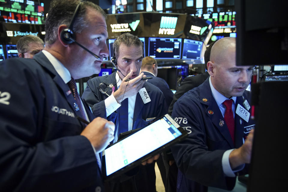 NEW YORK, NY - AUGUST 6: Traders and financial professionals work at the opening bell on the floor of the New York Stock Exchange (NYSE) on August 6, 2019 in the Brooklyn borough of  New York City. The Dow Jones Industrial Average traded 220 points higher at the open on Tuesday, after U.S. markets had their worst trading day of 2019 on Monday amid escalations in the U.S.-China trade war. (Photo by Drew Angerer/Getty Images)