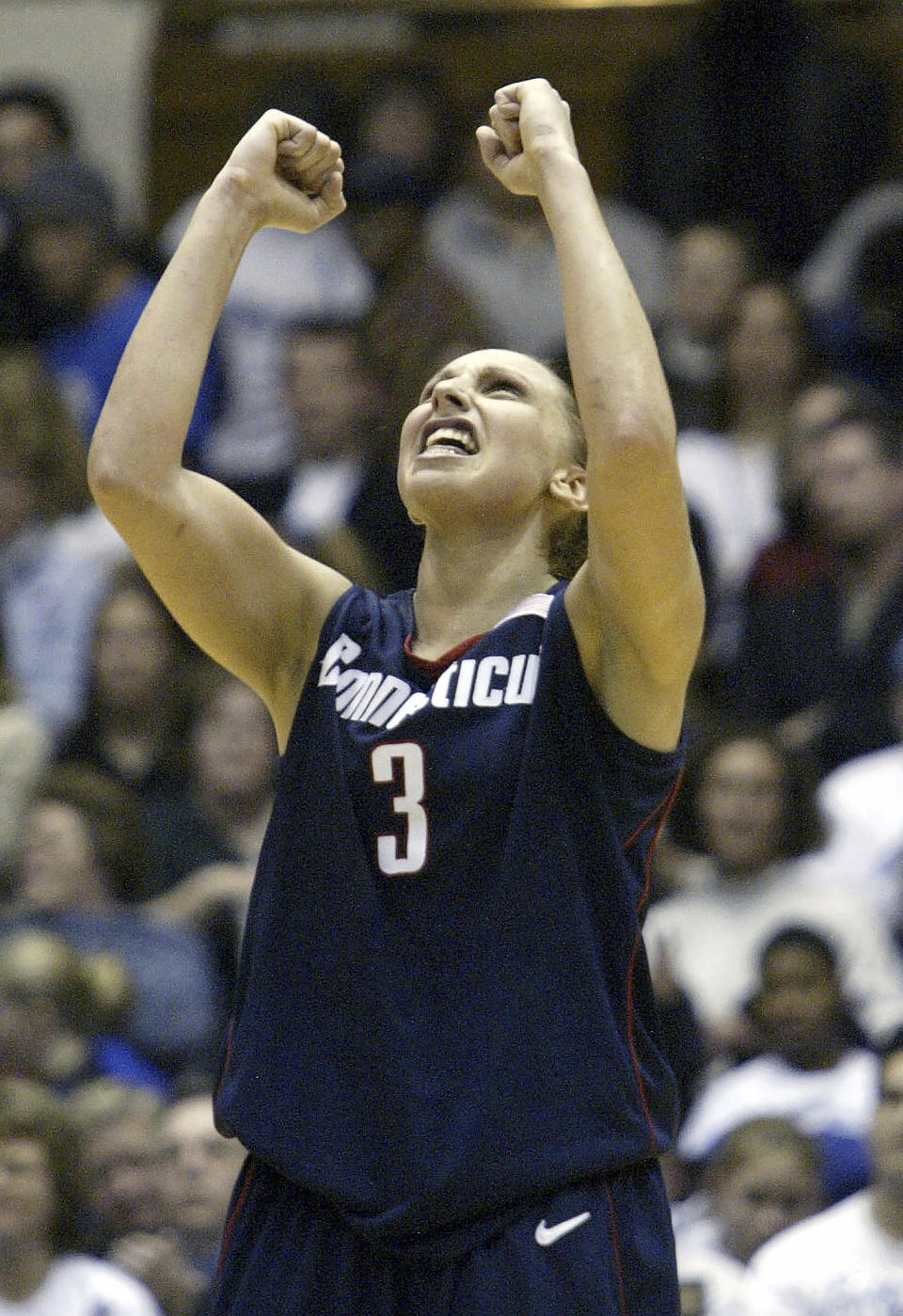 FILE - Connecticut's Diana Taurasi reacts during the closing seconds of her team's 77-65 win over No. 1 Duke Saturday, Feb. 1, 2003, at Cameron Indoor Stadium in Durham, N.C. Taurasi scored a team-high 17 points in the win. Iowa's Caitlin Clark will soon be the NCAA's scoring leader. That's fact and, in many minds, enough to put the 22-year-old star high up among the greats of college basketball. (AP Photo/Grant Halverson, File)