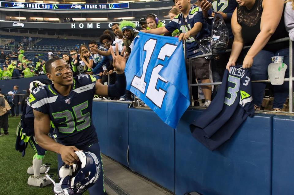 Aug 29, 2019; Seattle, WA, USA; Seattle Seahawks safety DeShawn Shead (35) interacts with fans after the game between the Seattle Seahawks and Oakland Raiders at CenturyLink Field. Seattle defeated Oakland 17-15. Mandatory Credit: Steven Bisig-USA TODAY Sports