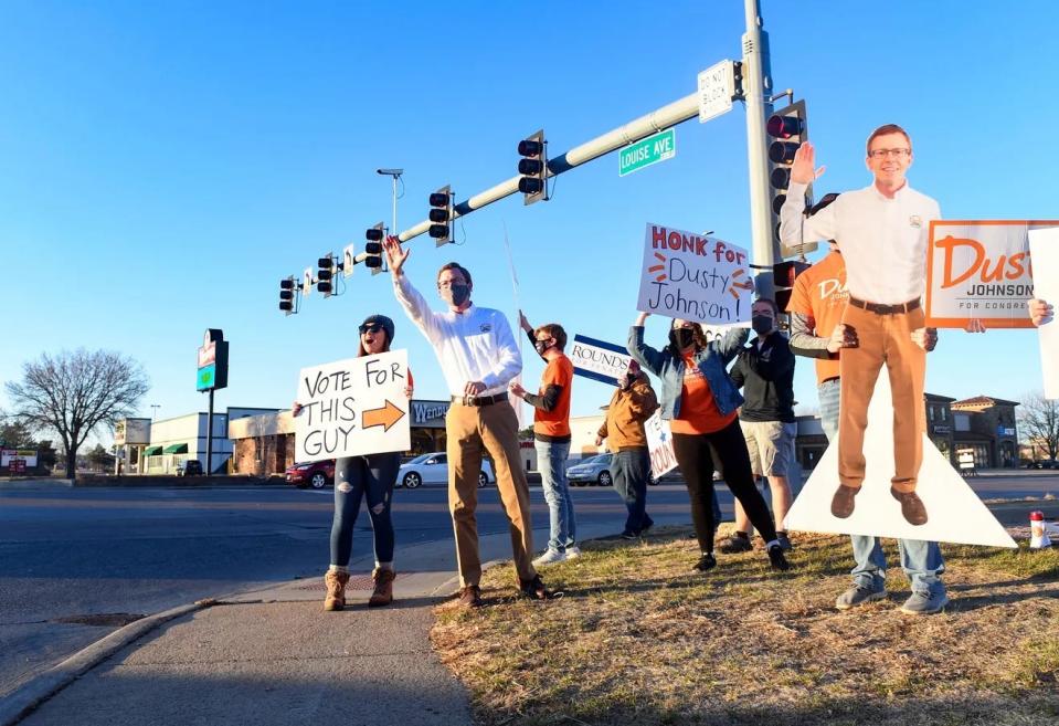 Congressman Dusty Johnson waves to supporters on Election Day in 2020.