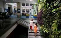 A view shows the working space with a vertical garden at Le Village by CA, a value-creating start-up incubator of banking group Credit Agricole, in Paris, France, July 7, 2017. REUTERS/Gonzalo Fuentes