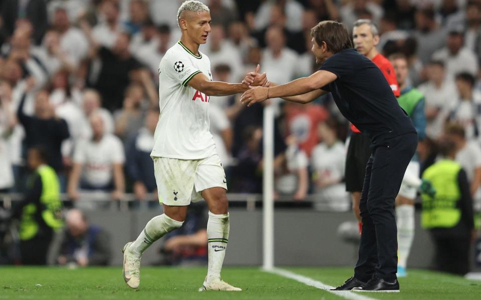  Richarlison of Tottenham Hotspur celebrates with Antonio Conte - Richard Heathcote/Getty Images