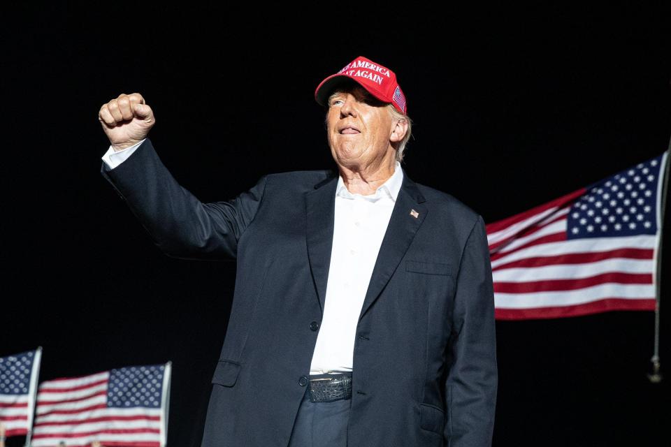 Former U.S. President Donald Trump takes the stage and speaks to a packed rally venue in Robstown, Texas, on Saturday, Oct. 22, 2022.