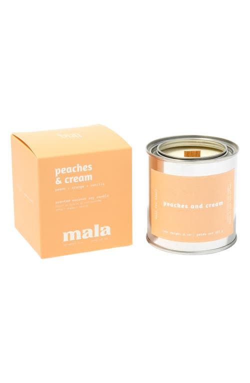 5) Peaches & Cream Scented Candle