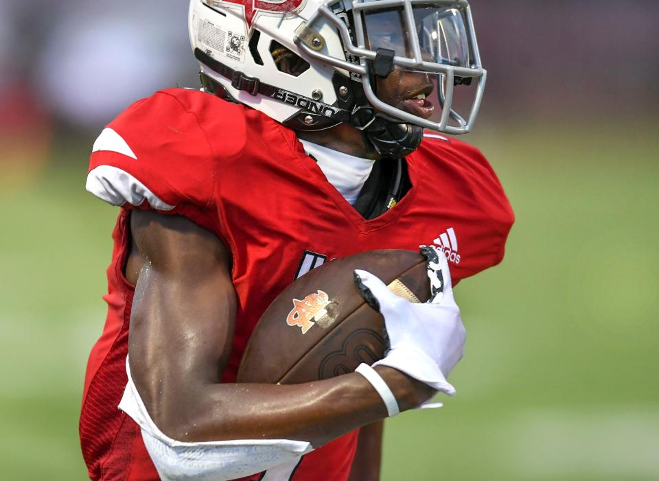 Vero Beach High School's Vandrevius Jacobs  escapes the grip of a South Fork defender as the Vero Beach High School Fighting Indians take on the South Fork Bulldogs on Friday, Aug. 26, 2022, at Billy Livings Field at the Citrus Bow in Vero Beach. Vero Beach won 54-6.  