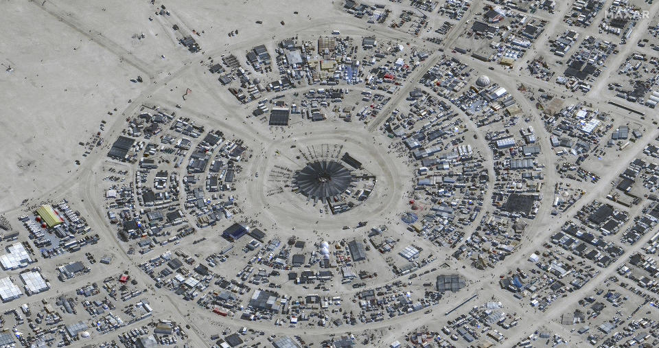 In this satellite photo provided by Maxar Technologies, an overview of Burning Man festival in Black Rock, Nevada, on Aug. 28, 2023.  / Credit: Maxar Technologies via AP