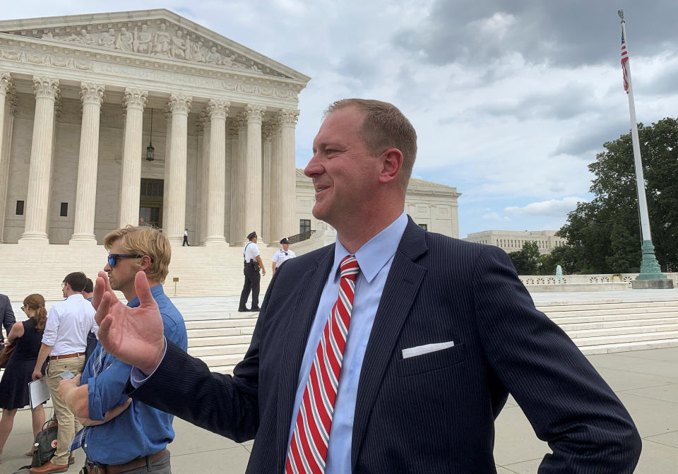 Missouri Attorney General Eric Schmitt speaks to Reuters after a news conference to announce an antitrust probe into big tech companies that focuses on Alphabet's Google, outside the U.S.  Supreme Court in Washington, U.S., September 9, 2019. REUTERS/Bryan Pietsch