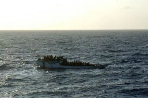 Photo taken by the MV Bison after arriving at the asylum-seeker boat before it capsized. Rescuers have plucked 130 people from the ocean after an asylum-seeker boat sank en route to Australia, barely a week after another vessel went down in the same area, killing up to 90