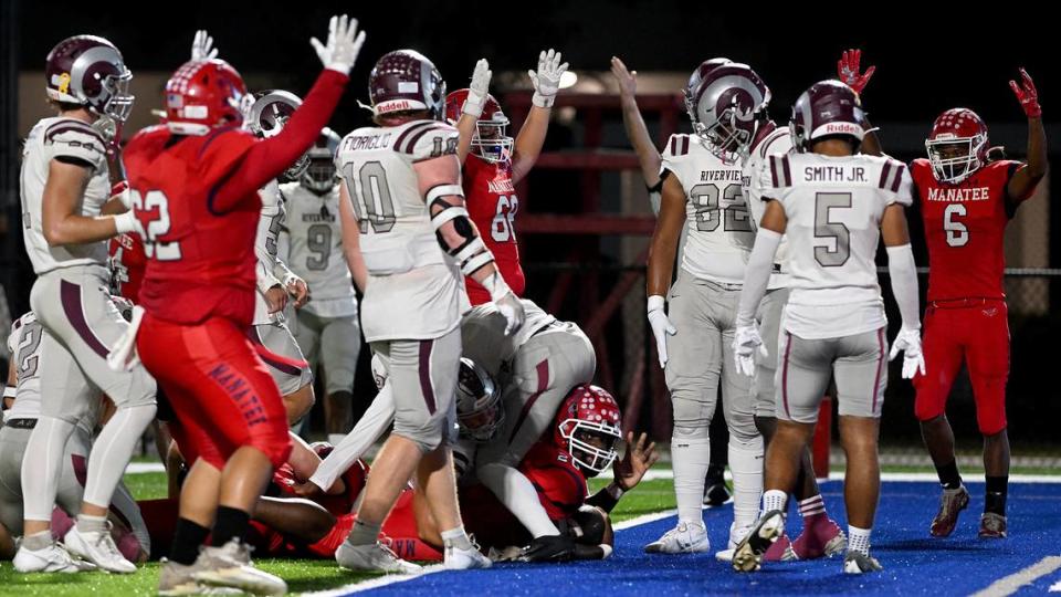 Manatee celebrates a touchdown at Joe Kinnan Field at Hawkins Stadium on Friday, Nov. 17, 2023.