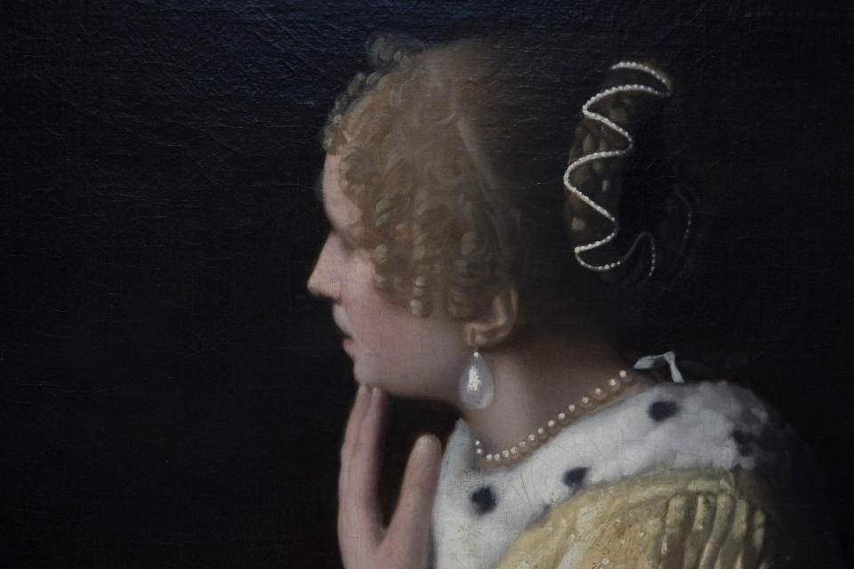 Detail of Mistress and Maid, on loan from the Frick Collection, New York, during a press preview of the Vermeer exhibit at Amsterdam's Rijksmuseum, Monday, Feb. 6, 2023, which unveils its blockbuster exhibition of 28 paintings by 17th-century Dutch master Johannes Vermeer drawn from galleries around the world. (AP Photo/Peter Dejong)