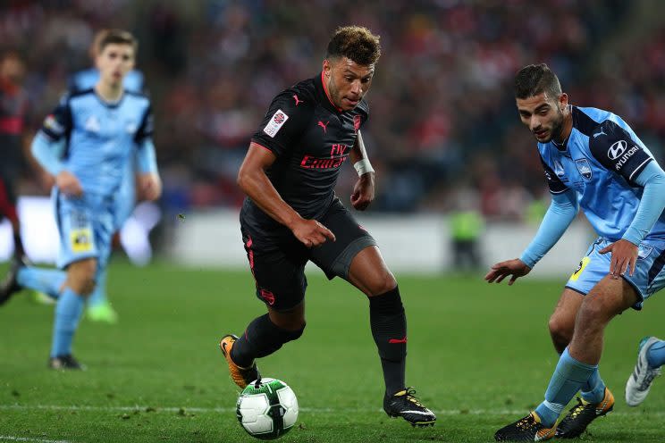 Alex Oxlade-Chamberlain of Arsenal controls the ball after replacing Alexis during the match between Sydney FC and Arsenal FC