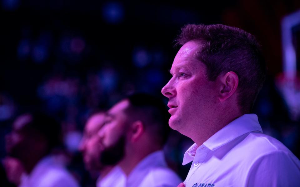 Colorado State basketball coach Niko Medved stands for the national anthem before a game against Gardner-Webb at Moby Arena on Nov. 7, 2022.