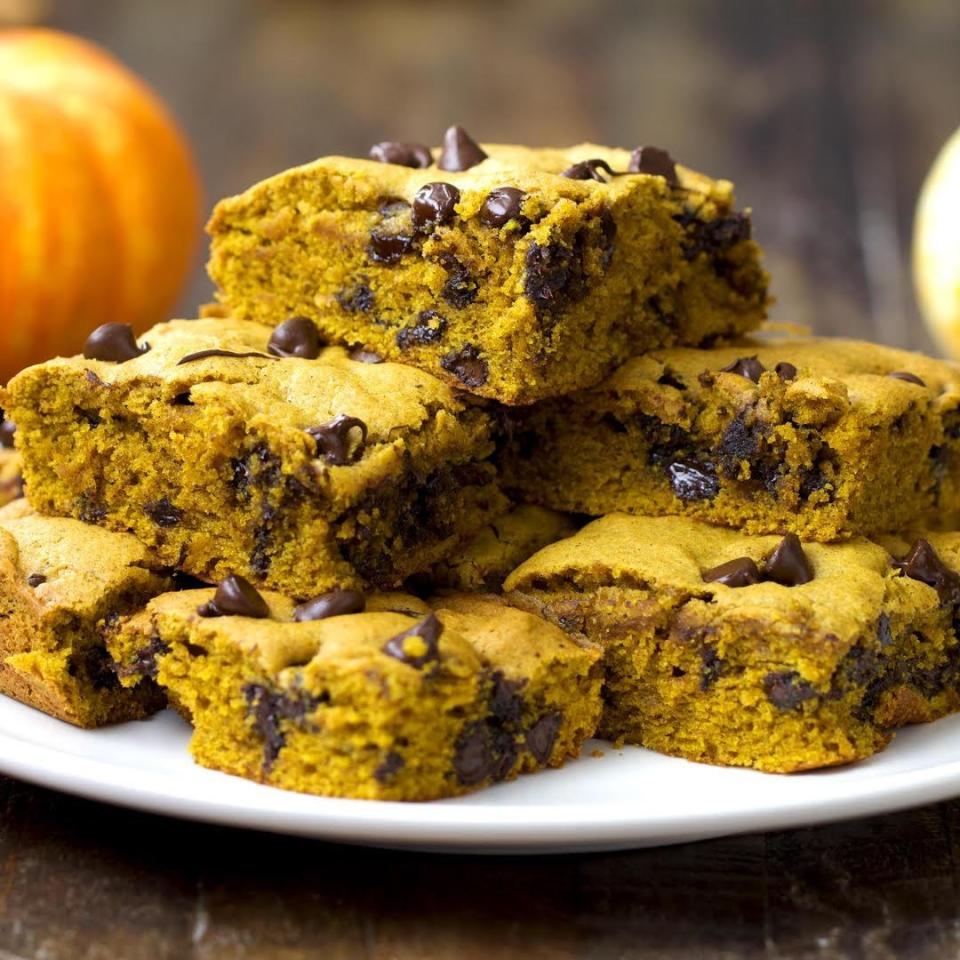 A plate of pumpkin bars sprinkled with chocolate chips