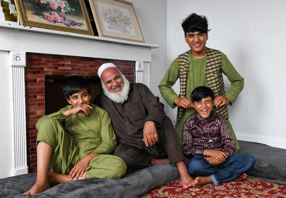 Aug 7, 2023; Buffalo, NY, USA From left, Irshad Shams, 12, Mohammad Hakim Hotak, 68, Mohammad Shams, 14, and Mustafa Shams, 8, are photographed at their home in Buffalo, N.Y., Tuesday, August 7, 2023. Mohammed arrived alone to the USA in November 2021, just two months after the fall of Kabul. He didn't speak English and had no other relatives with him. At the two-year anniversary of the U.S.'s hasty retreat from Afghanistan, authorities continue to struggle with what to do with the remaining Afghan youths in U.S. custody.