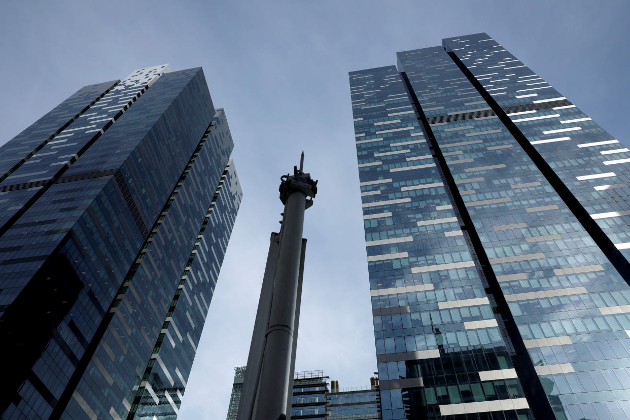 Asia Square Towers One and Two (R) are seen in Singapore September 21, 2017. REUTERS/Edgar Su